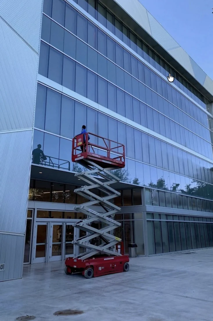 Elevated access beside the glass exterior of the ICA Museum in Miami