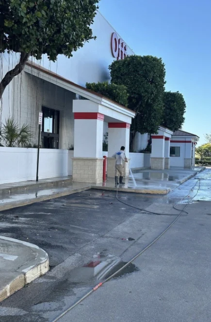 Exterior storefront and pedestrian surfaces at the Hialeah shopping center